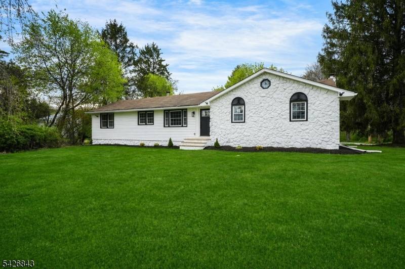 A rare find ! Welcome to this exquisitely reimagined ranch style residence set on a beautifully expansive lot framed by mature trees, this home offers a great sense of privacy ...