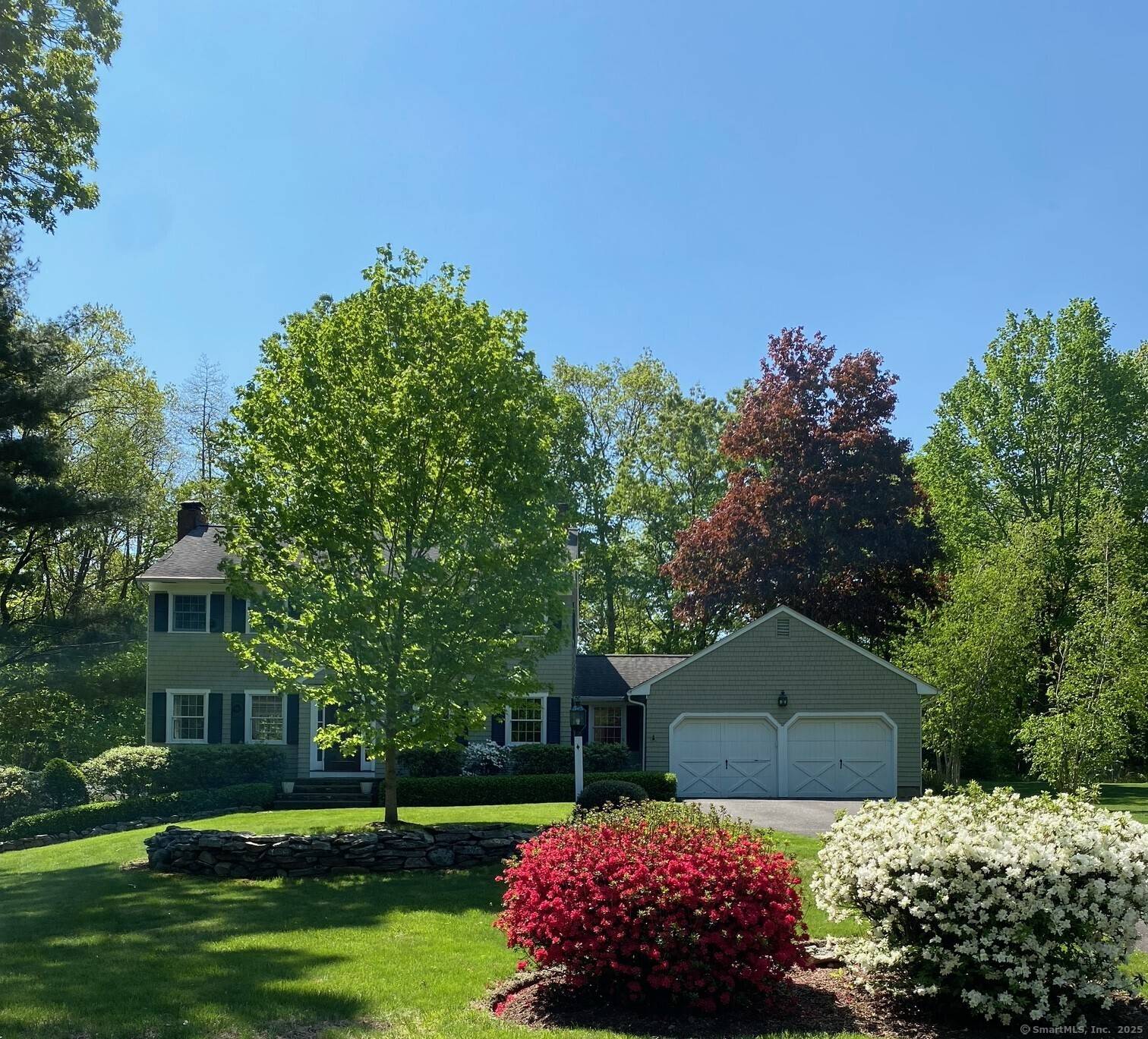 This custom built, center hall Colonial combines timeless design with thoughtful updates and it is in move in condition ready for you to enjoy from day one.