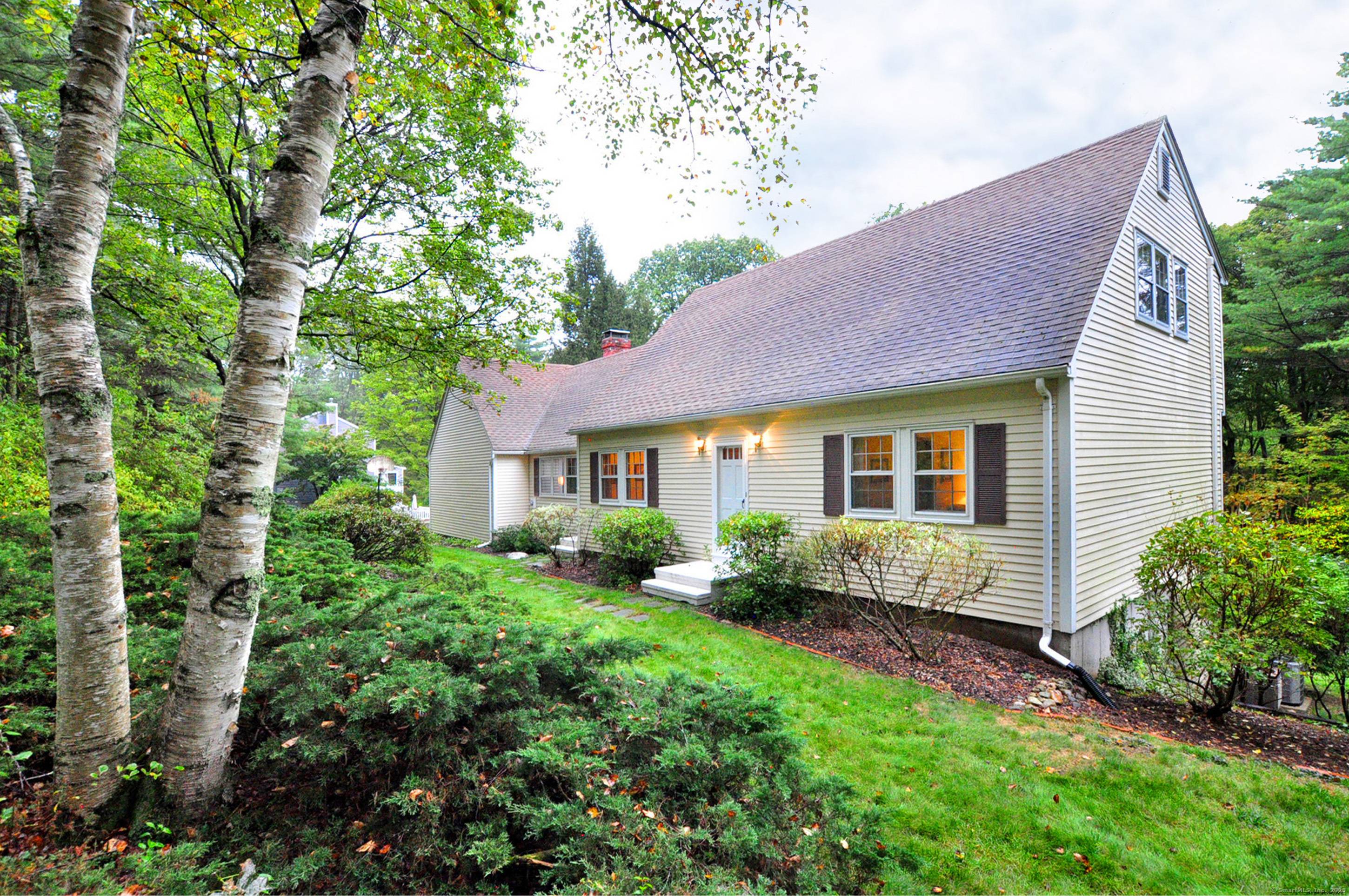 PRICE IMPROVED ! Discover this spacious and light filled 3 BR Contemporary Cape on a peaceful cul de sac in beautiful Canton Valley !