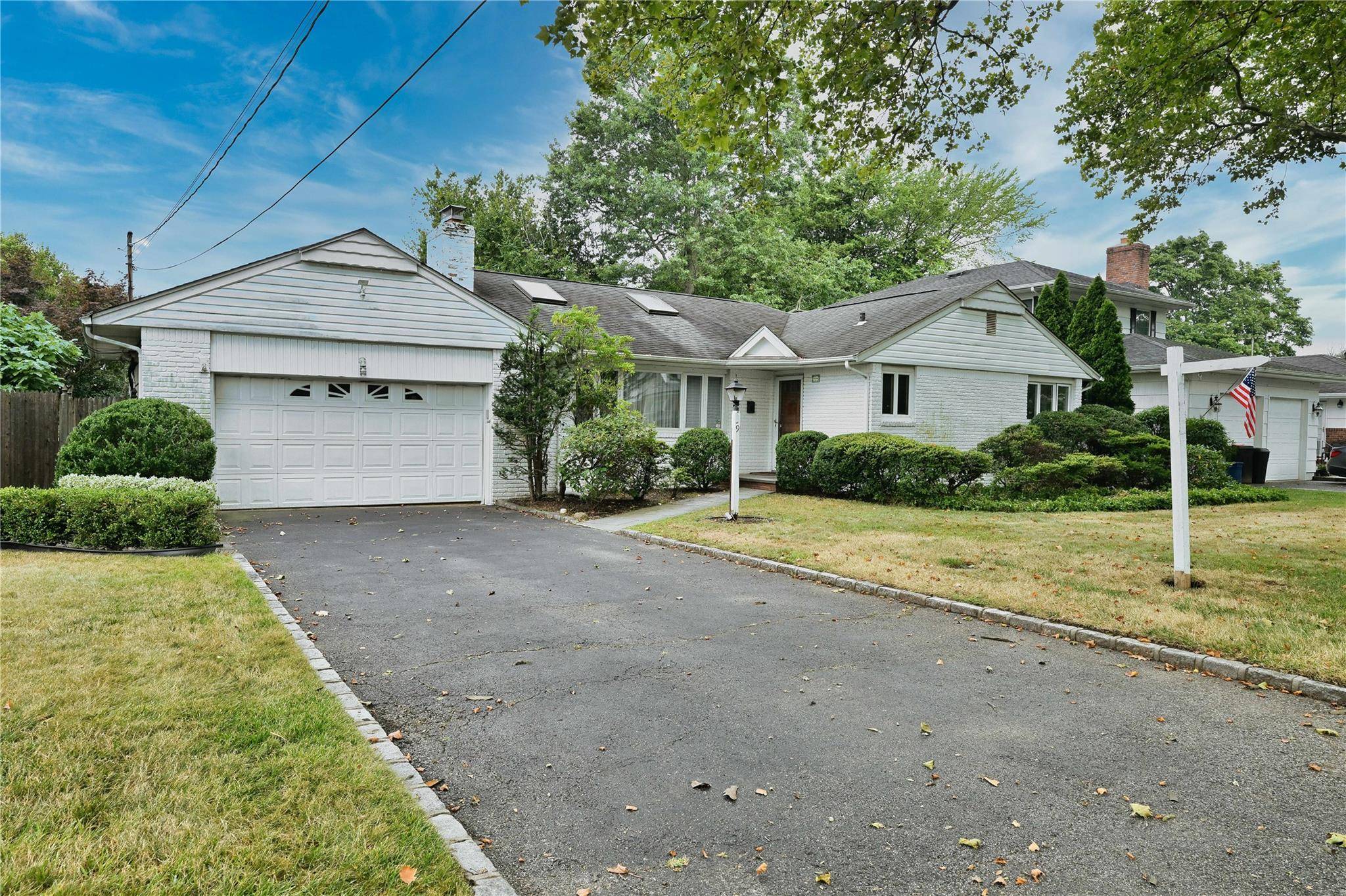 Welcome to 9 Marion Street, a 4 bedroom, 2 bath ranch nestled in the heart of Greenvale.