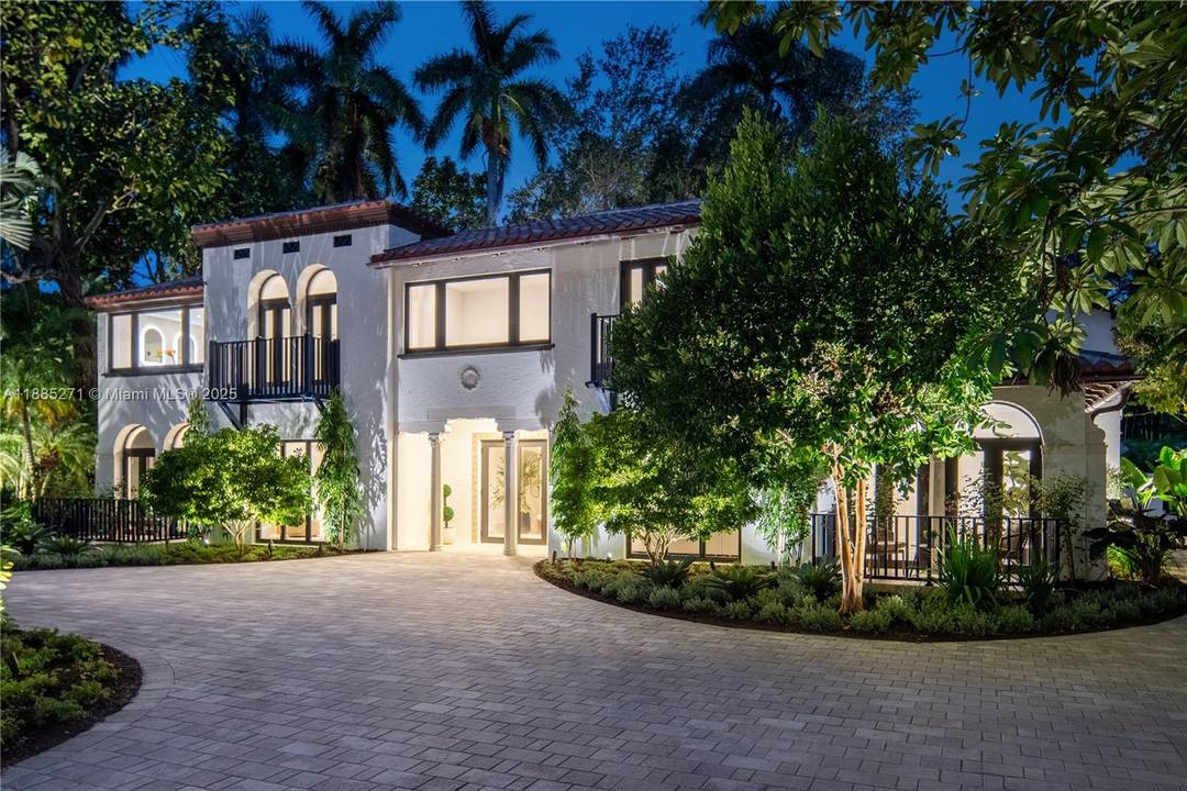 Set on a serene 21, 000 sf gated estate in Coconut Grove, this Richard Kiehnel designed Spanish Colonial home combines rich history with modern luxury.