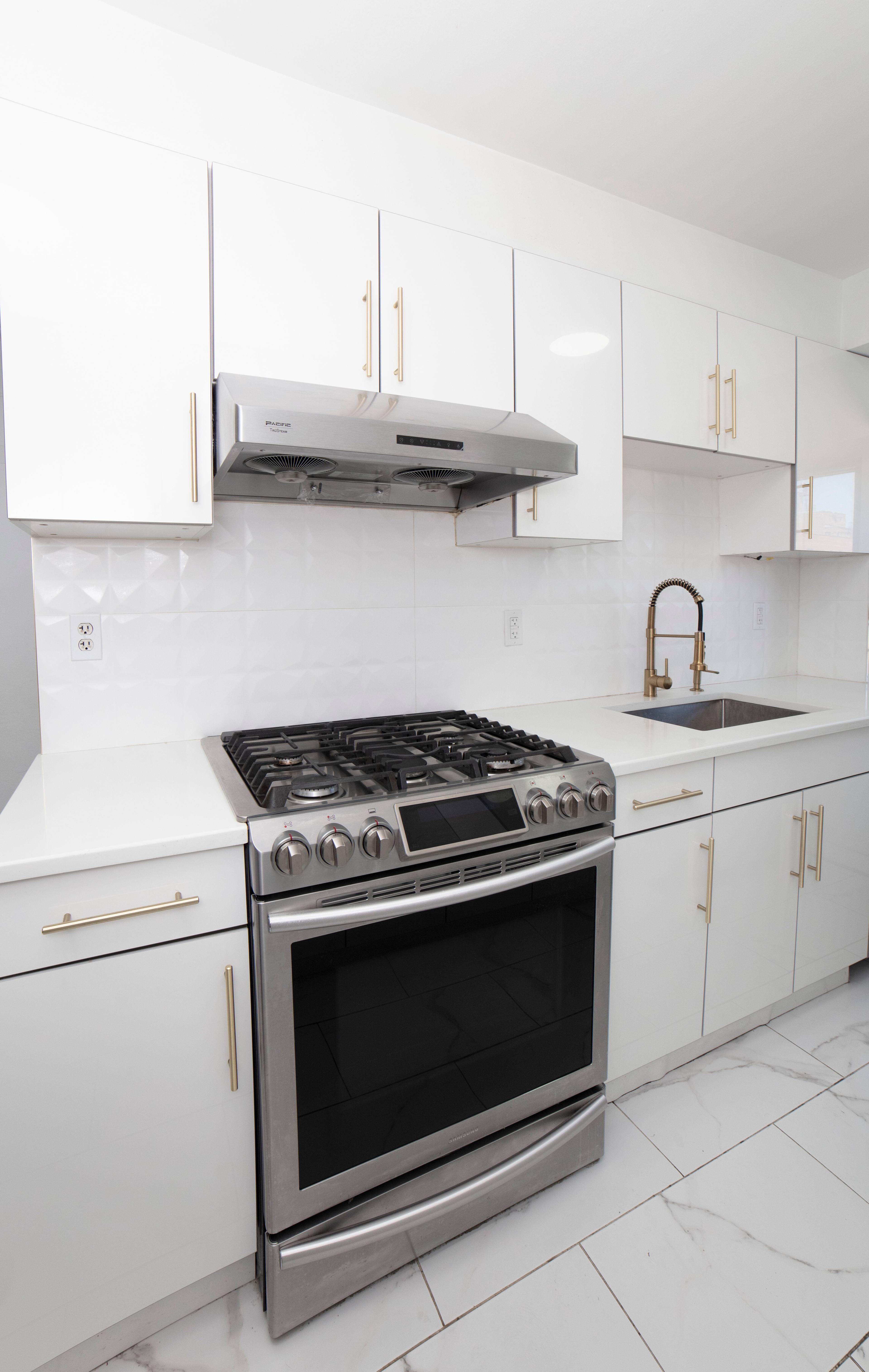 Beautifully renovated, spacious, and complimented by iconic NYC skyline views !