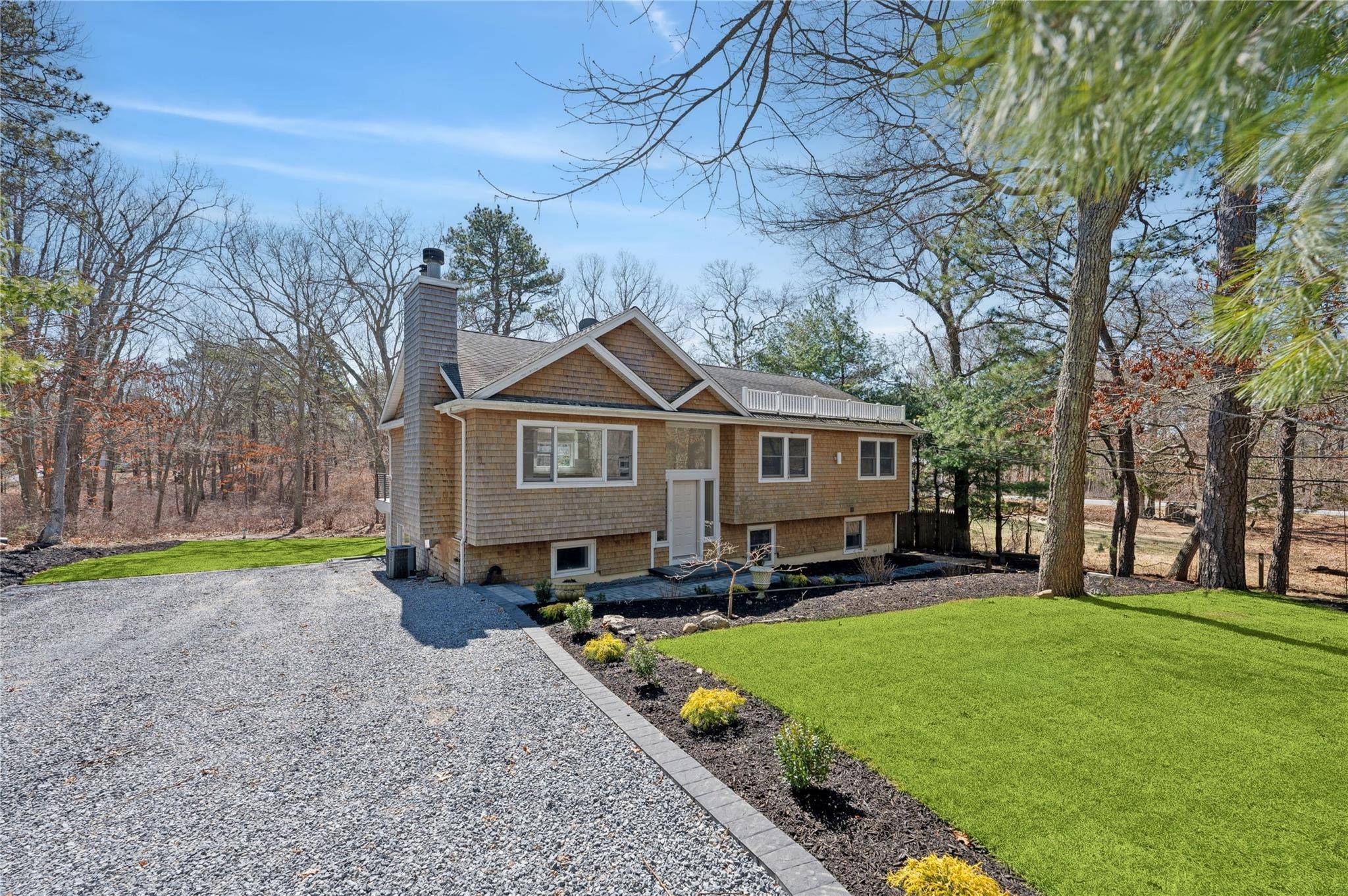 Welcome to this newly renovated split level home in the desirable Red Creek area of Hampton Bays.