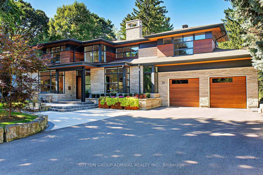 An extraordinary architectural triumph by renowned designer David Small, this Mineola masterpiece represents the pinnacle of modern luxury living.