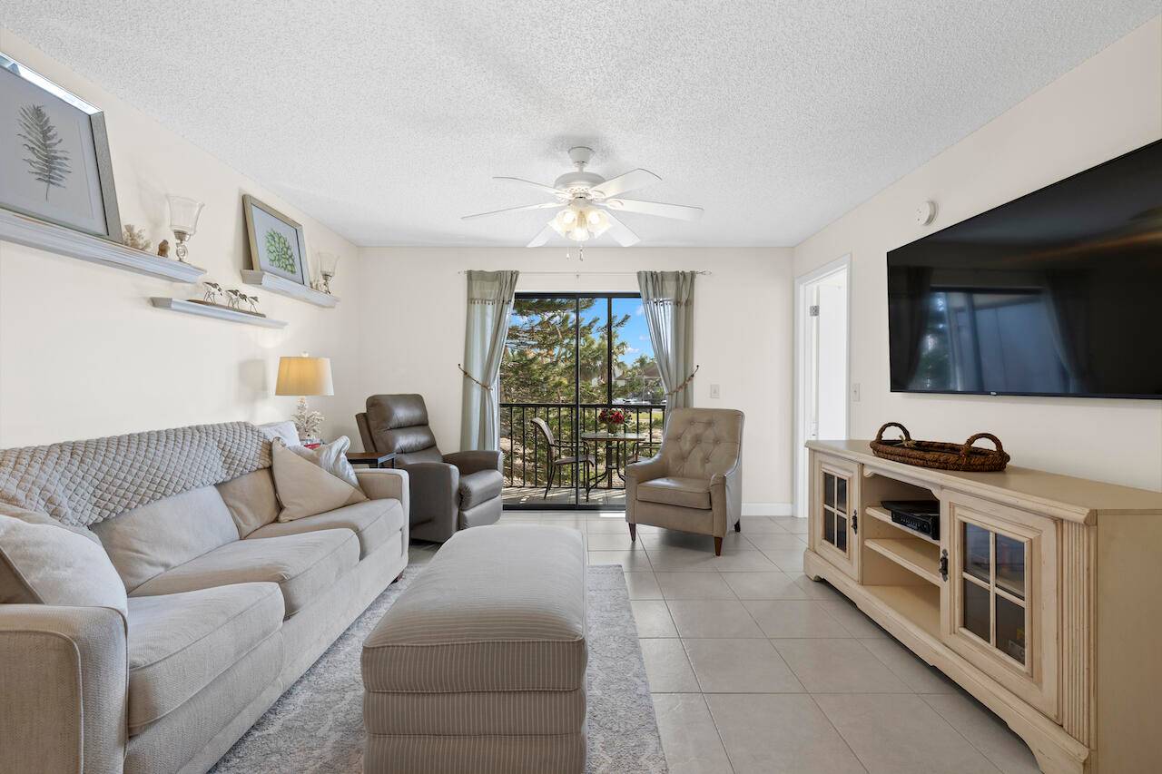 Seller is Motivated ! Don't Miss This Updated 55 Condo in Lucerne Lakes, Lake Worth, FL NEW ROOF have been installed, and the assessment is paid in full !