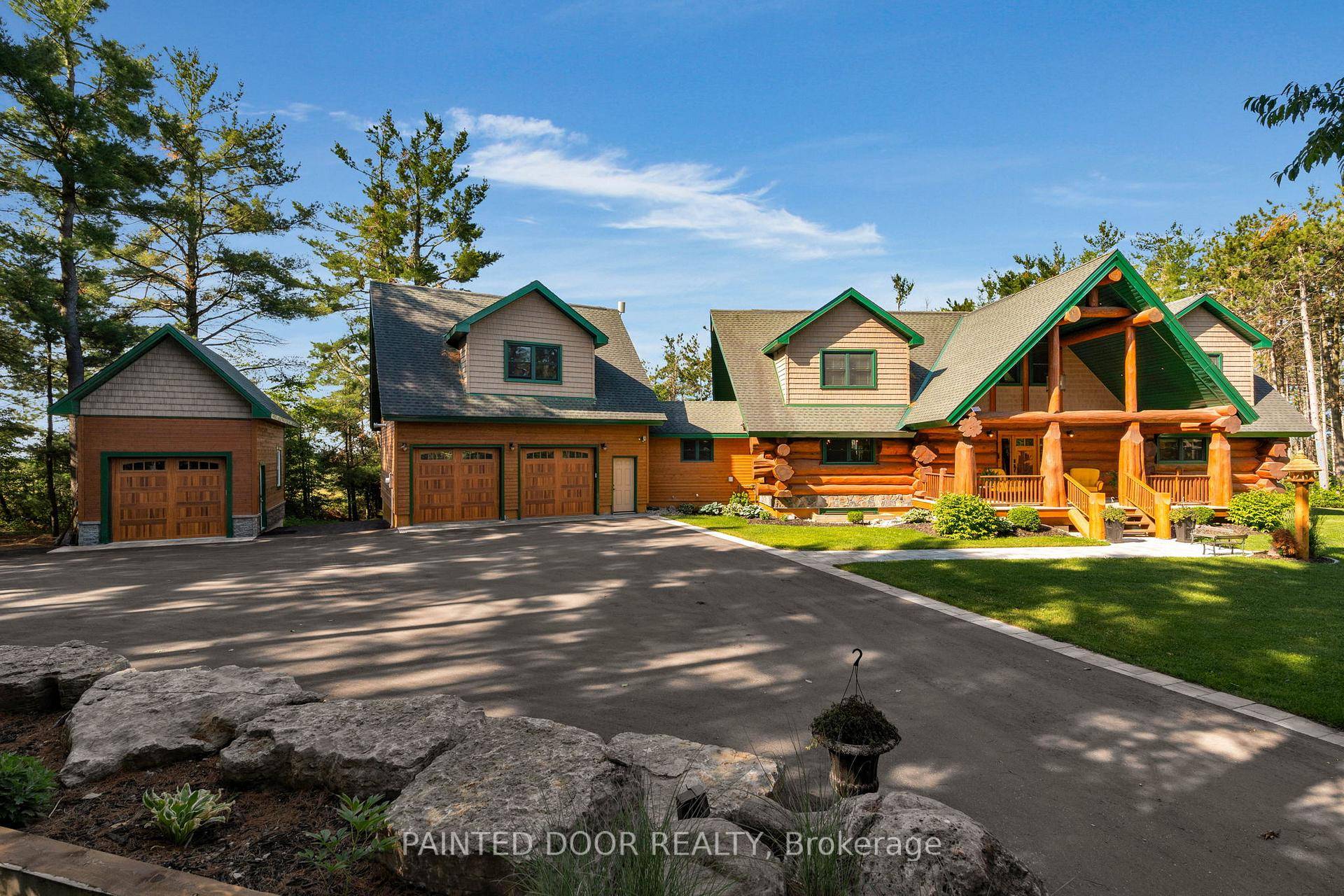 Prepare to be awestruck by this one of a kind custom built log home crafted from hand peeled Western Red Cedar.
