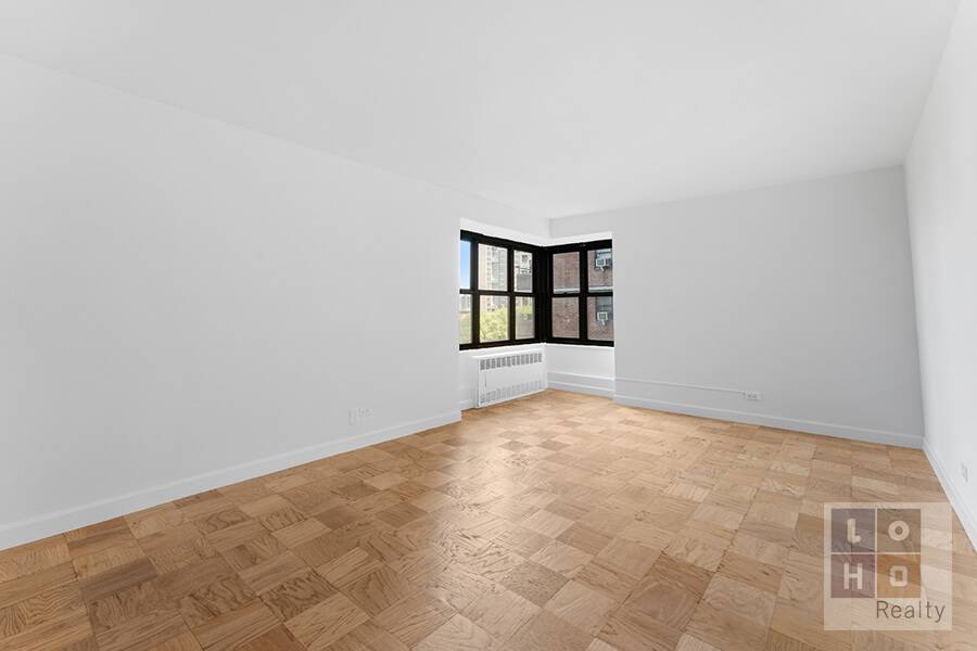 Spacious True 2 Bedroom with Serene Park Views and Prime Seward Park Location !