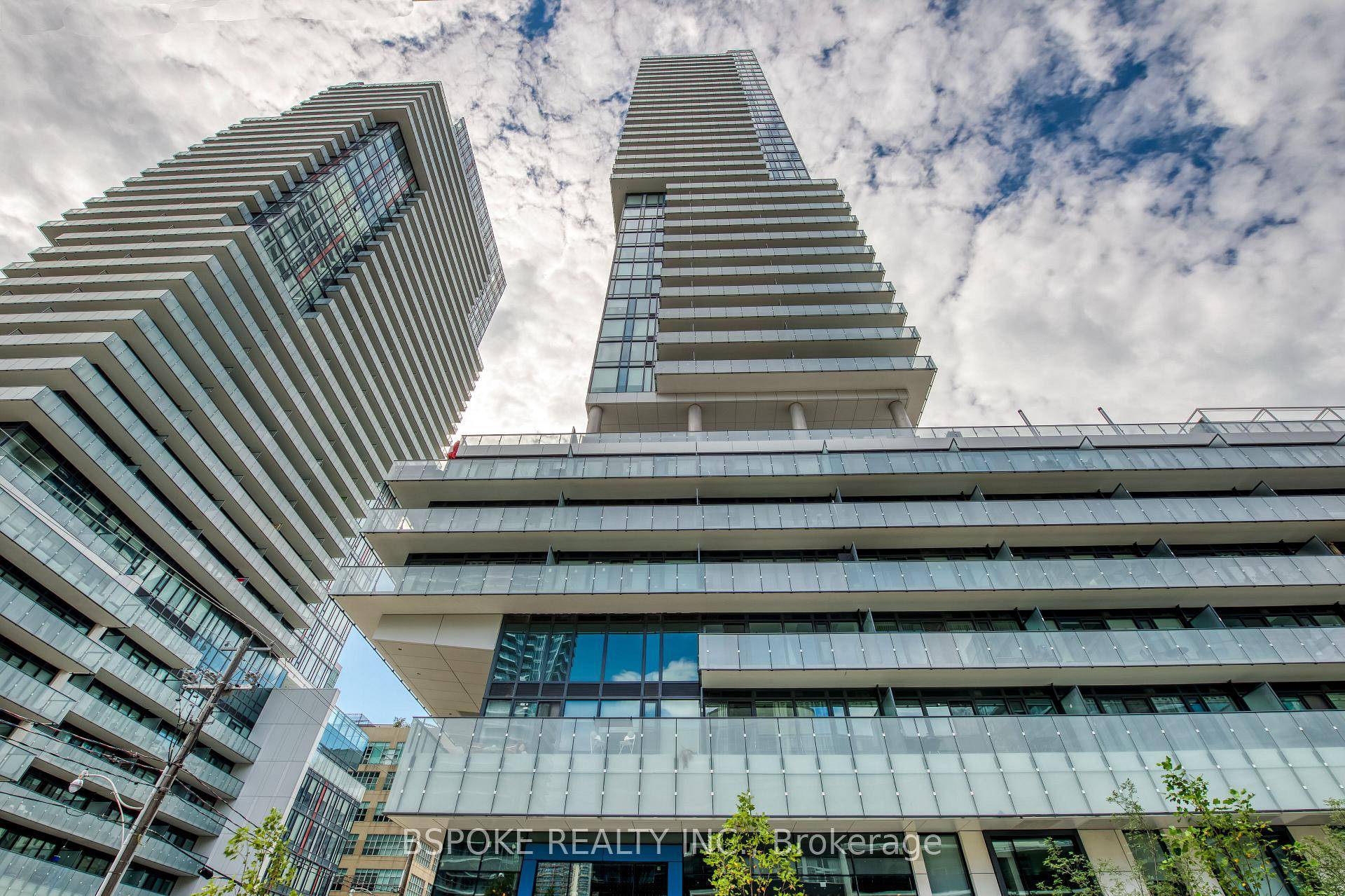 Beautiful 1 Bed plus Den Unit at 161 Roehampton, featuring over 9ft exposed concrete ceiling giving a loft like feeling, floor to ceiling windows, laminate flooring, granite countertops, centre island, ...