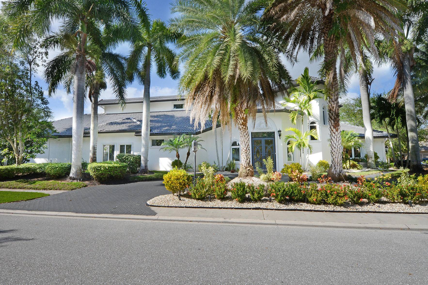 Enter the exclusive Boca Raton Plantation country club.