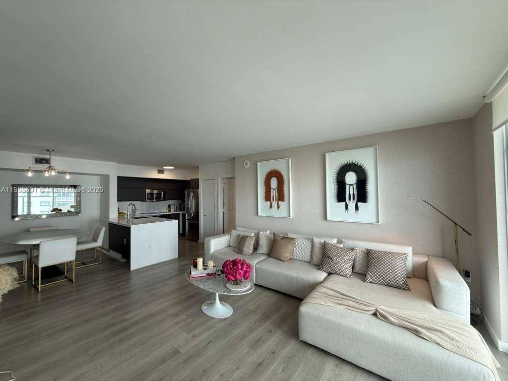 Enjoy breathtaking Bay and Brickell Key views from this split 2 2 bedroom unit at The Mark on Brickell.