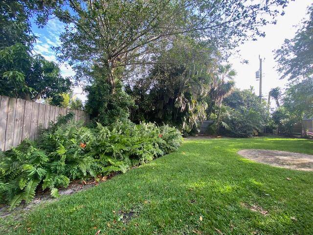 This Ross built CBS home surrounded by lush landscaping offering total privacy is located in the highly desirable Boradmoor neighborhood in Soso.