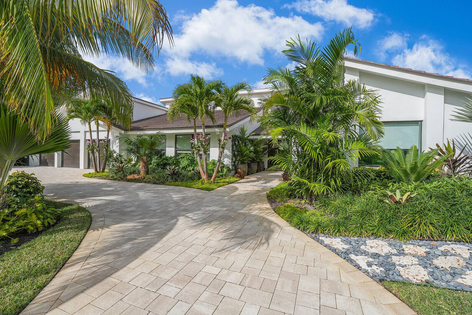 A gem awaits at 4561 Oak Tree Court, a fully remodeled single story masterpiece nestled in the prestigious Seagate Golf at the Hamlet.