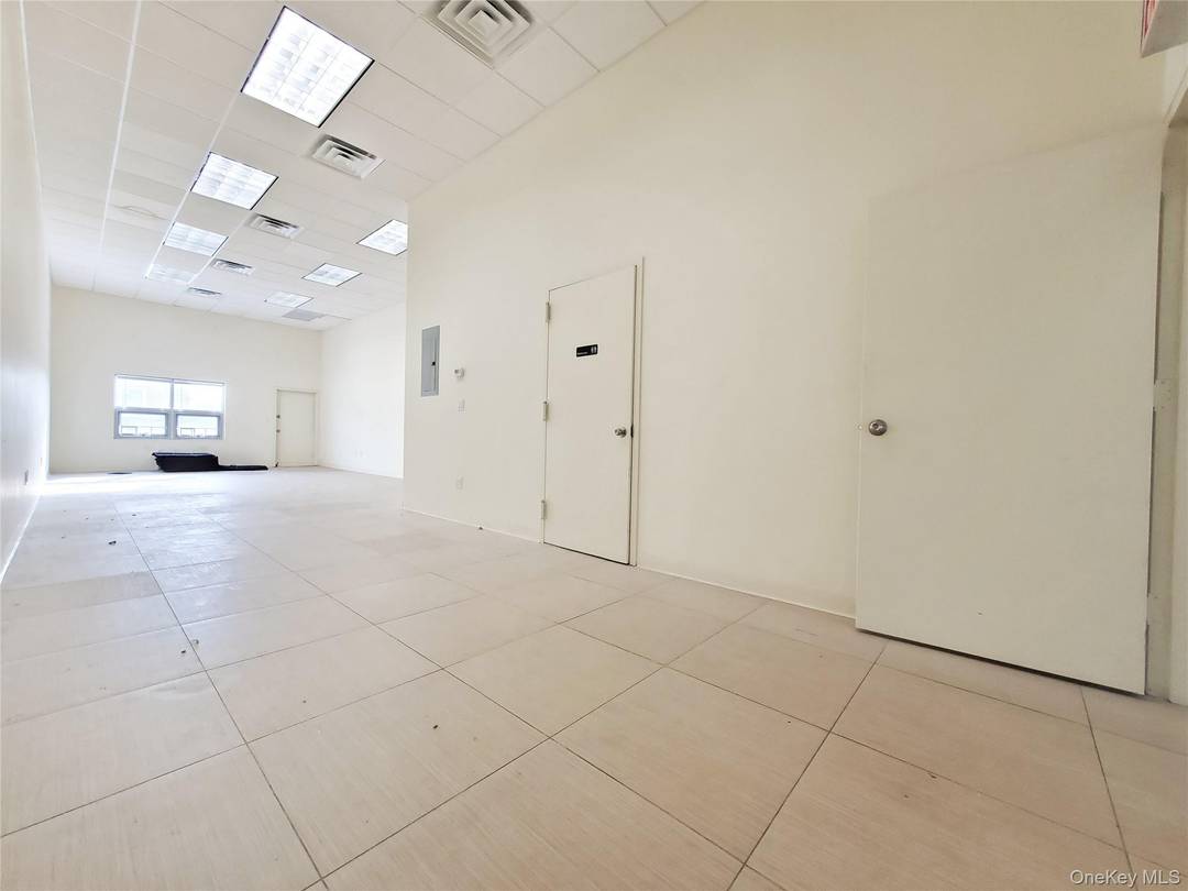 Young year 2010 built spacious high ceiling brick building with elevator.