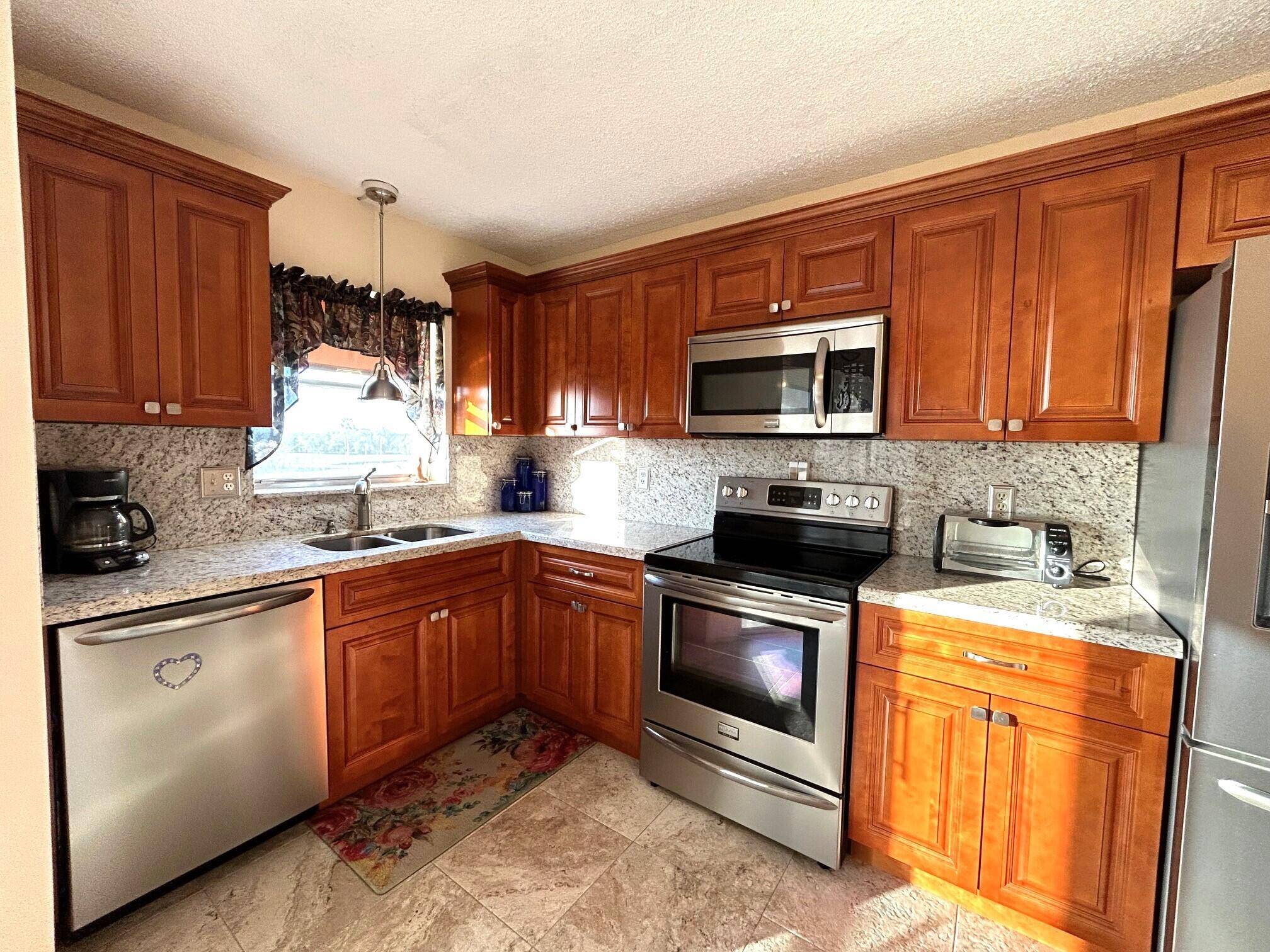 Beautiful Golf course view condo in the 55 community of the Poinciana Country Club.