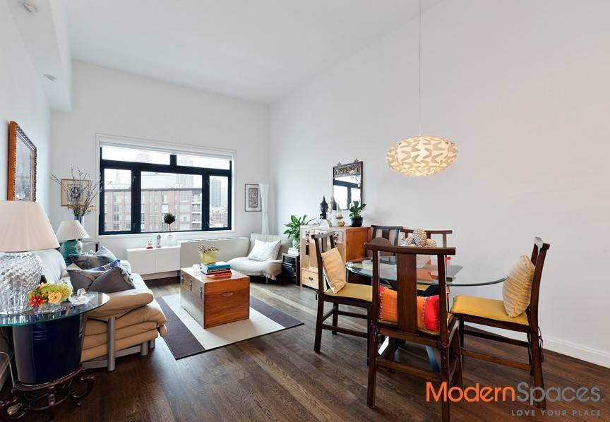 A beautiful 2BR 2BA featuring 12 ft high ceiling, split two bedrooms layout with 1075 sq ft is available for rental at L Haus Luxury Condo.