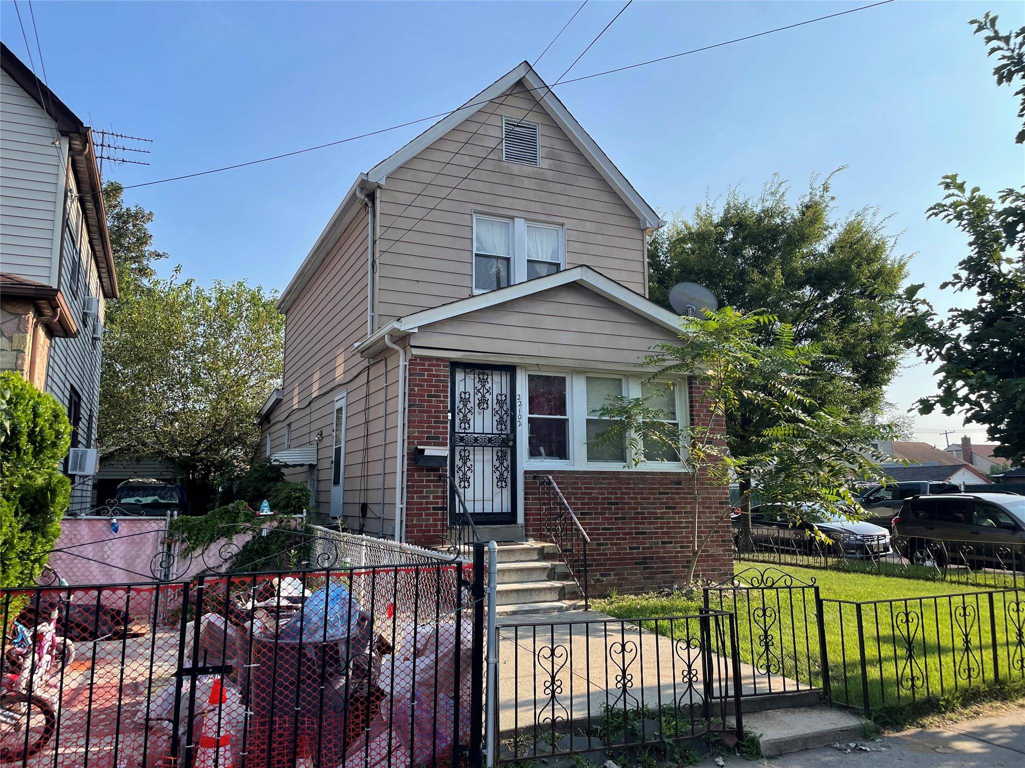 Nice 2 Family Corner Property Being Used As One Family.