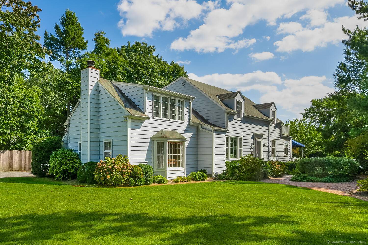 Tucked at the end of a quiet cul de sac, 20 Seagate Road is a rare find in one of Darien's most sought after waterfront neighborhoods.