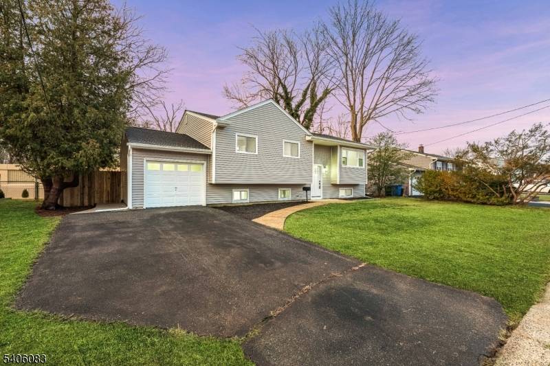 Location, Location, Location Modernized home features Fresh paint throughout, ready for your decorating touches.