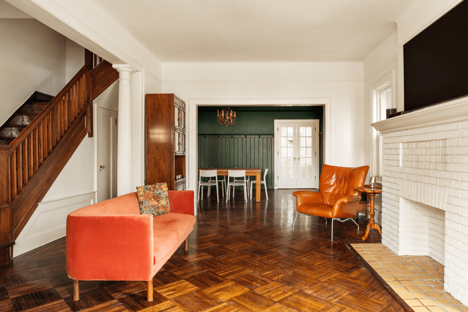 This semi detached four story brick townhouse with a private driveway and garage stands as a testament to thoughtful preservation and contemporary sophistication.