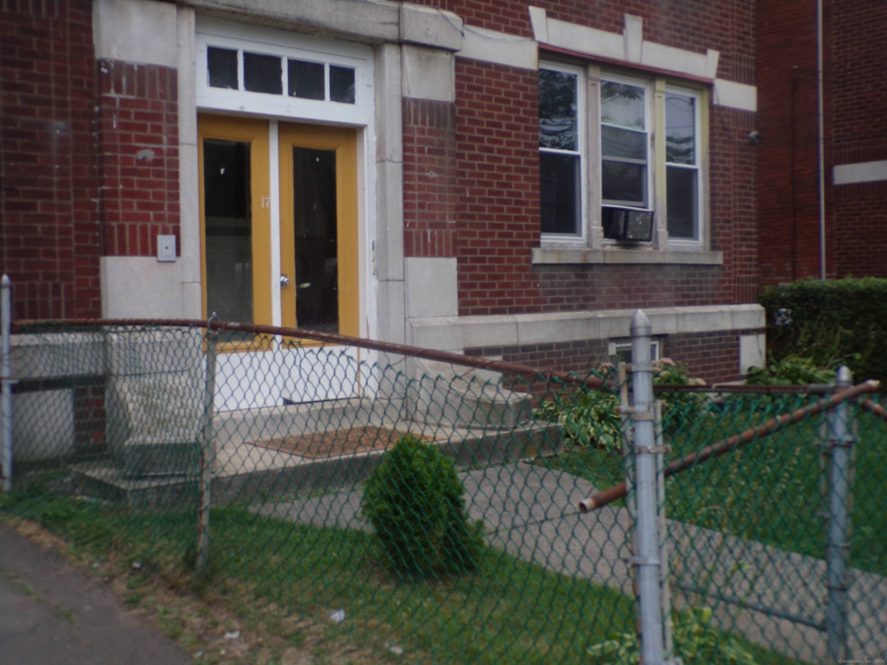 Solid three family brick structure, boasting good mechanicals, and finished living space in basement.