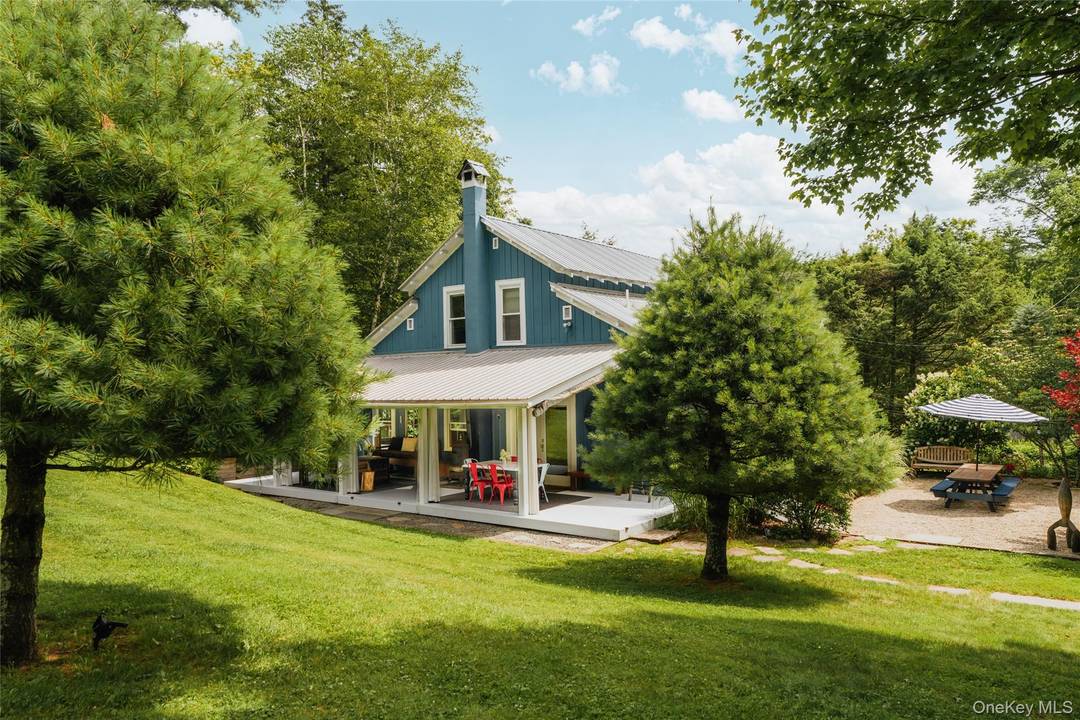 Overbrook House is a design forward Catskills retreat on nearly an acre that lives much larger thanks to multiple eye popping indoor outdoor spaces including a dreamy separate Guest Studio ...
