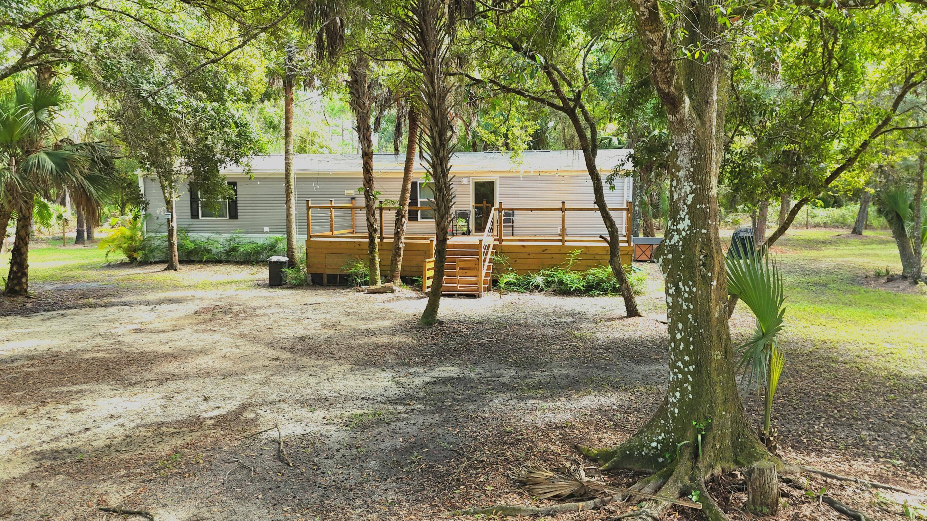 Discover this charming, almost brand new manufactured home built in 2023a true hidden gem surrounded by nature's beauty.