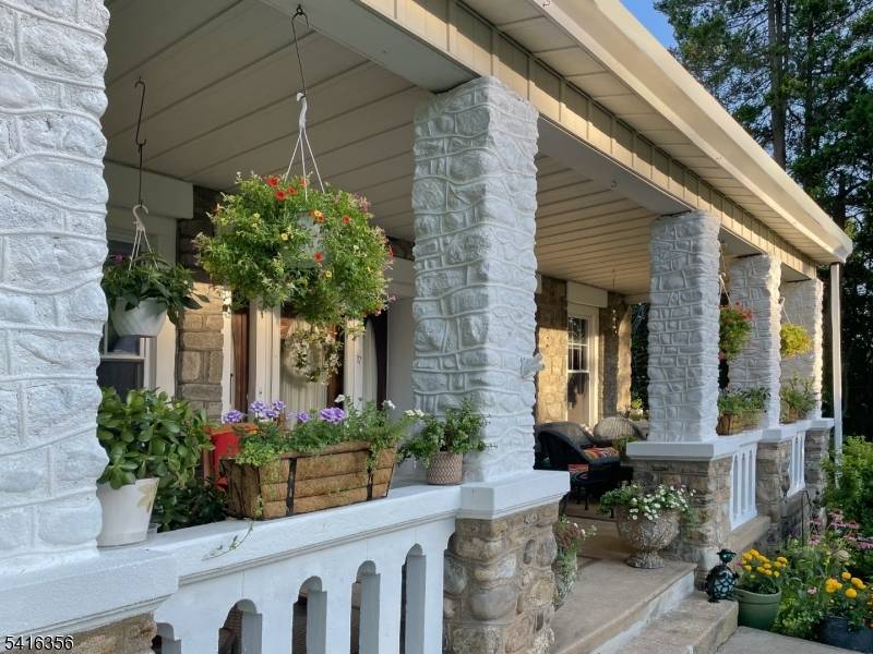 You will fall in love with this home right from the start w a large covered porch w stone columns, where you will spend hours.
