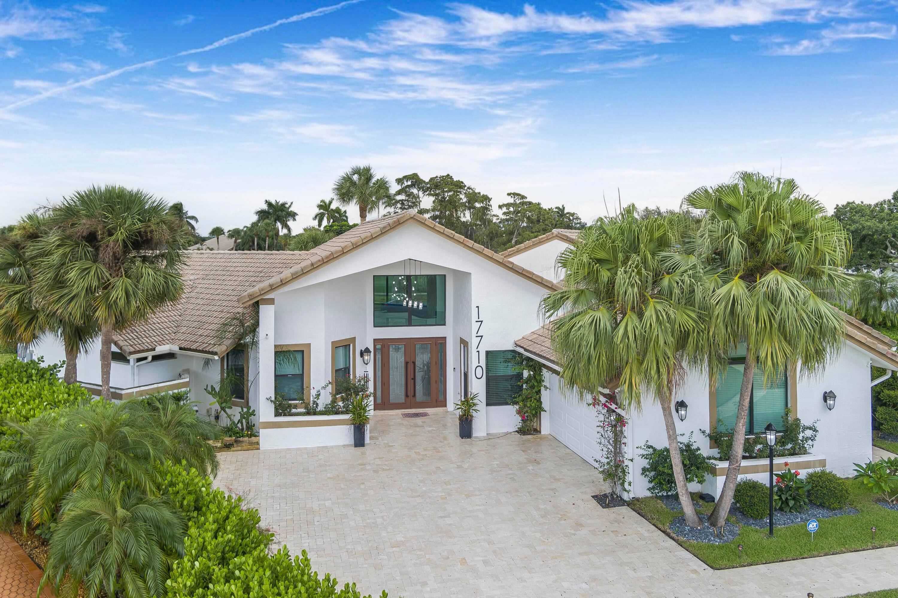 Experience the pinnacle of luxury and lifestyle in this exquisitely remodeled lakefront estate, perfectly positioned on one of the largest lake view cul de sac point lots in Stonebridge Country ...