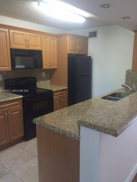 Spacious unit in convenient location near highways and shopping.