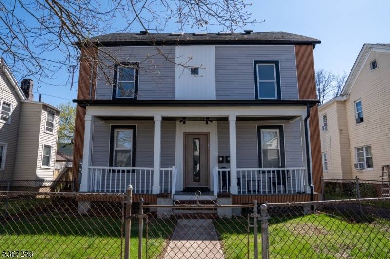 This two family home has been fully rebuilt with a reimagined floor plan and brand new systems, including electrical, plumbing, HVAC, as well as modernized kitchens and bathrooms.