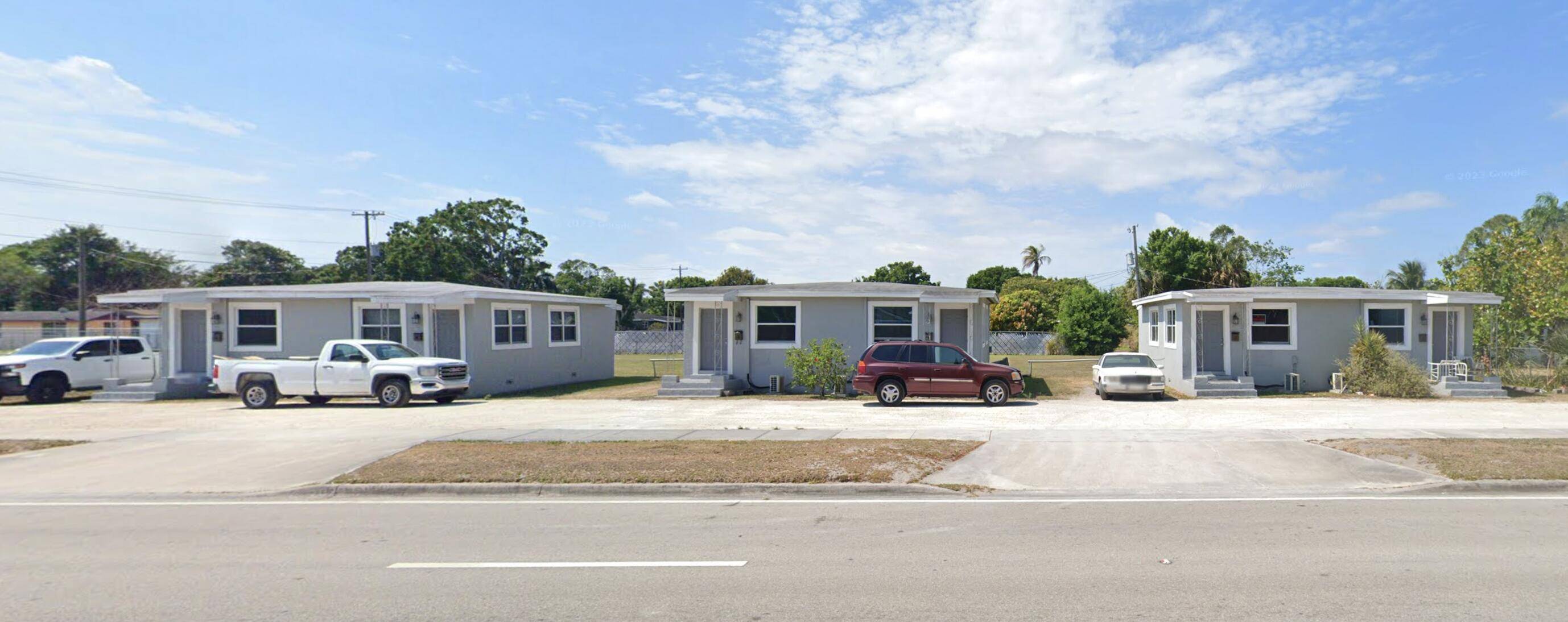All three duplexes included in listing price.