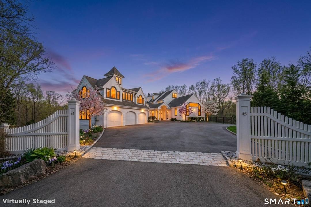 Exceptionally located less than a tenth of a mile from both the town green and beaches with your own private beach access this stunning residence sits on 1.
