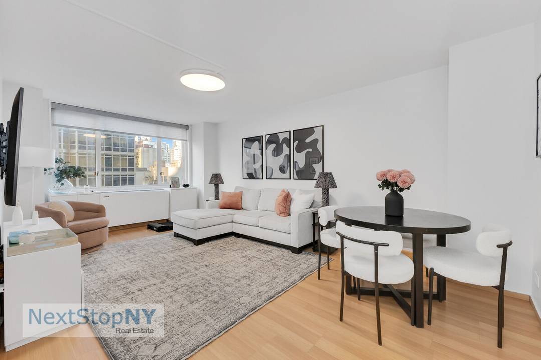 This light filled home offers eastern city views, a spacious living room and bedroom, and a clean, modern kitchen featuring new countertops and stainless steel appliances.