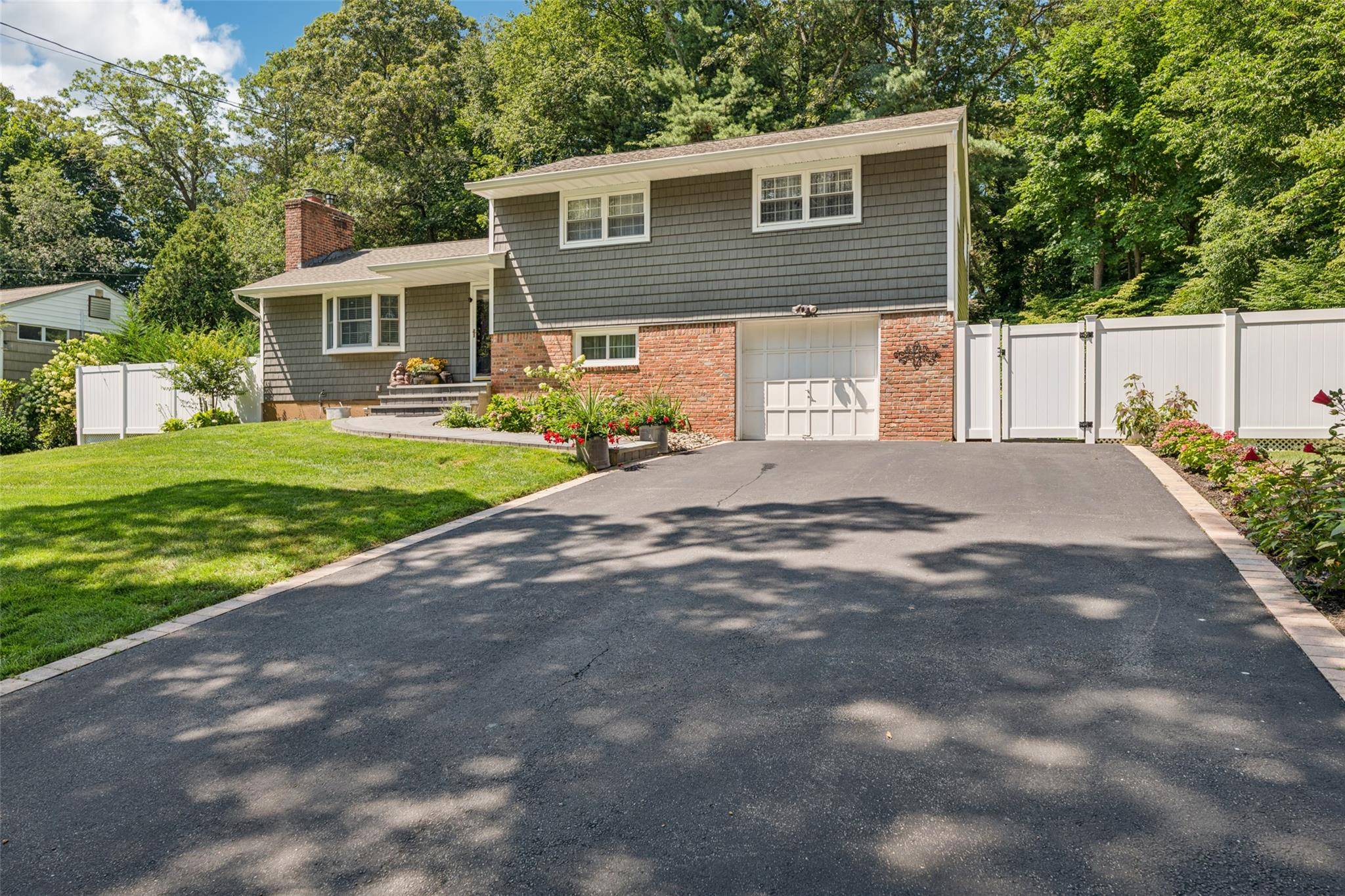 Outstanding curb appeal from this move in ready home on a quiet country lane.