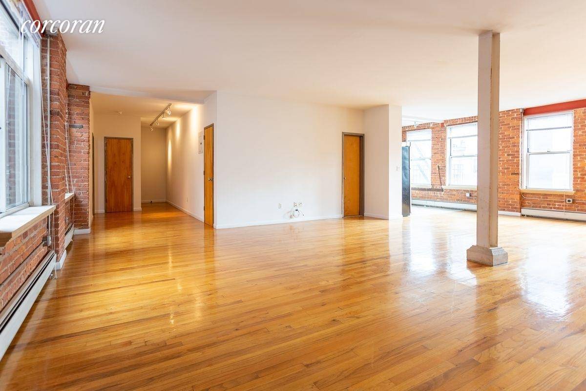 Apartment 5A is an open concept apartment with great natural light and a beautiful steel I Beam.