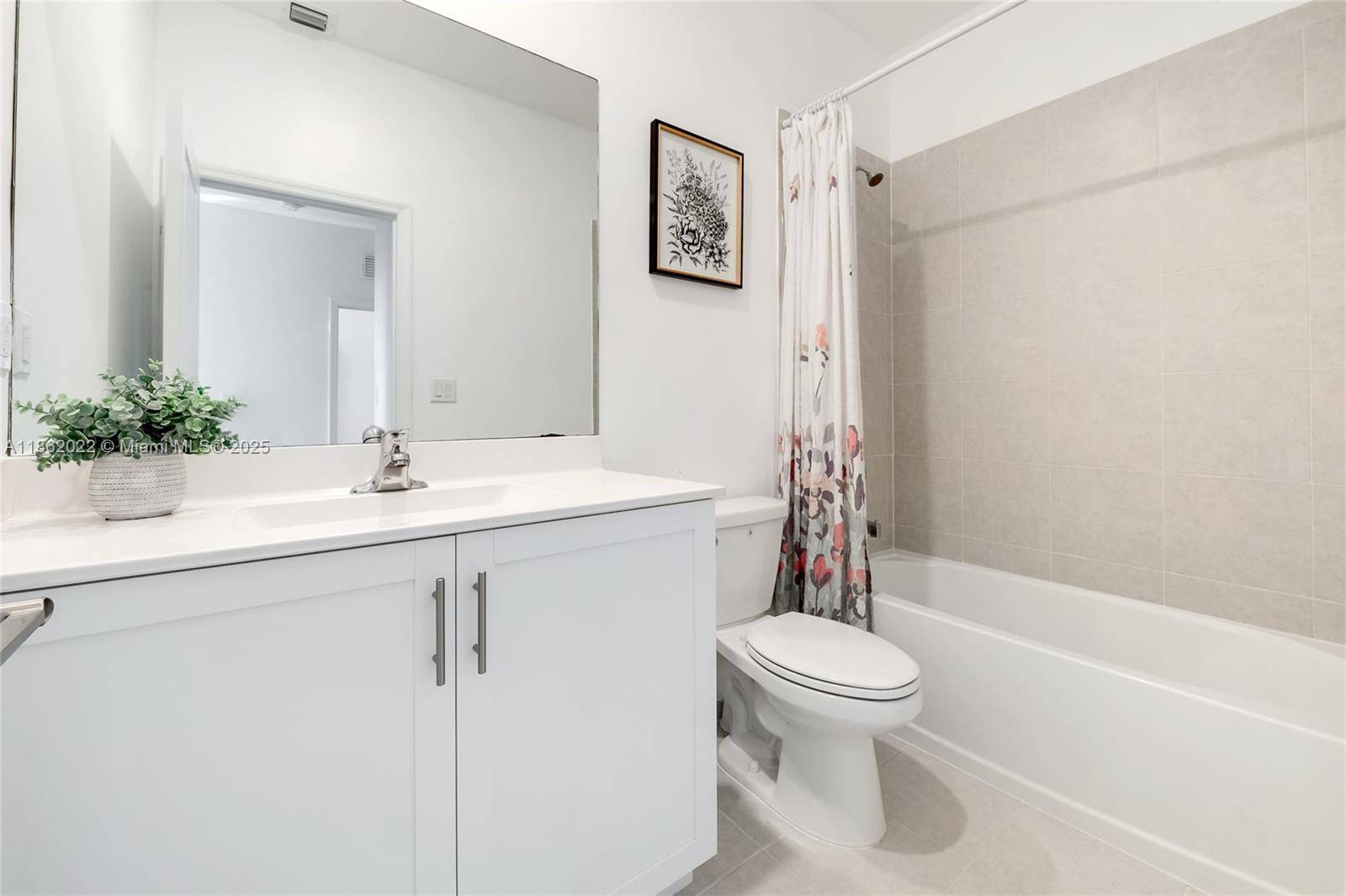 Enjoy stunning lake views from this beautiful townhome in the desirable Crystal Cay community !