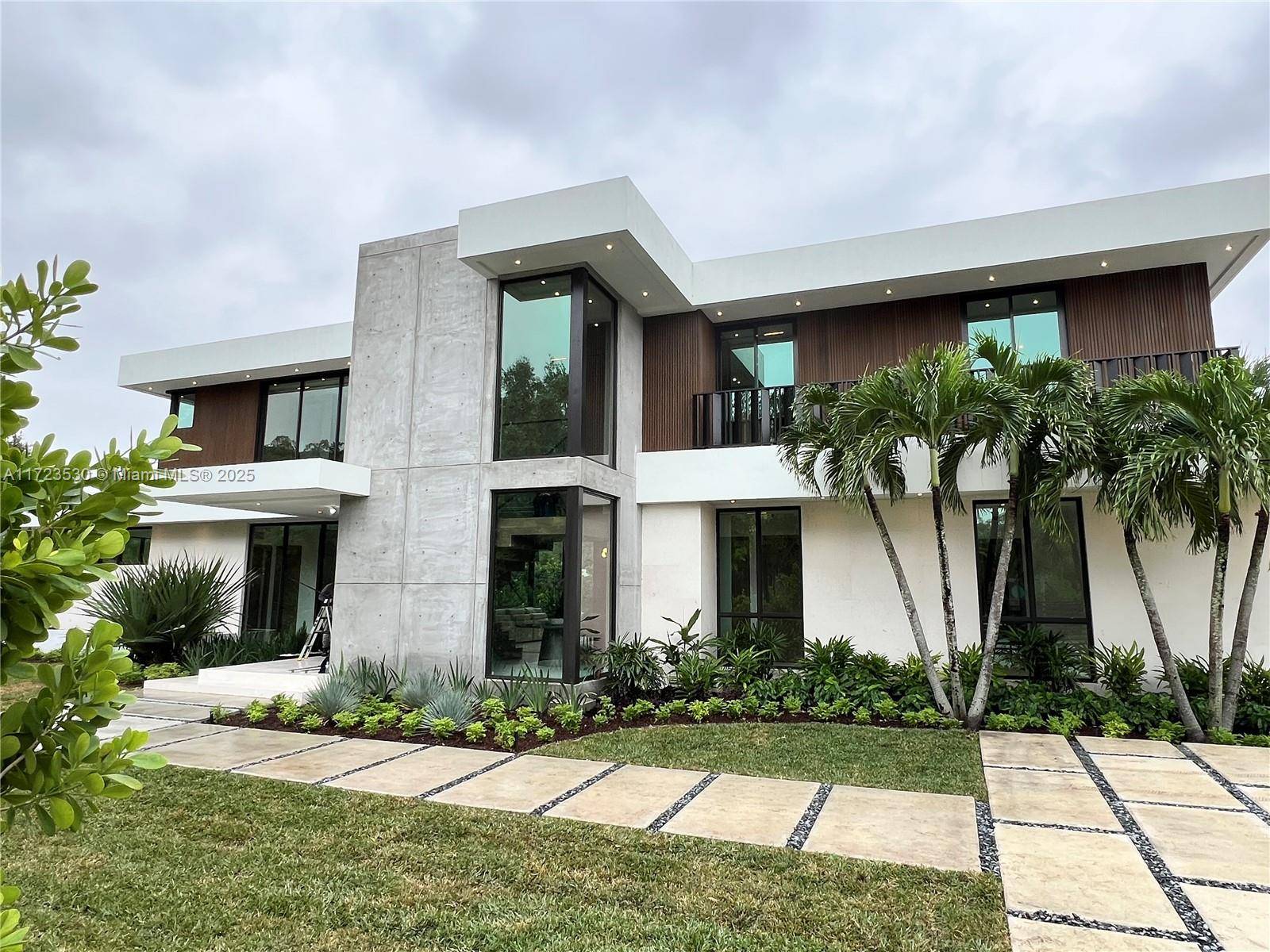 This contemporary masterpiece in Pinecrest, sitting on a 30, 492 SqFt lot, is now completed and ready for you to make it your own.