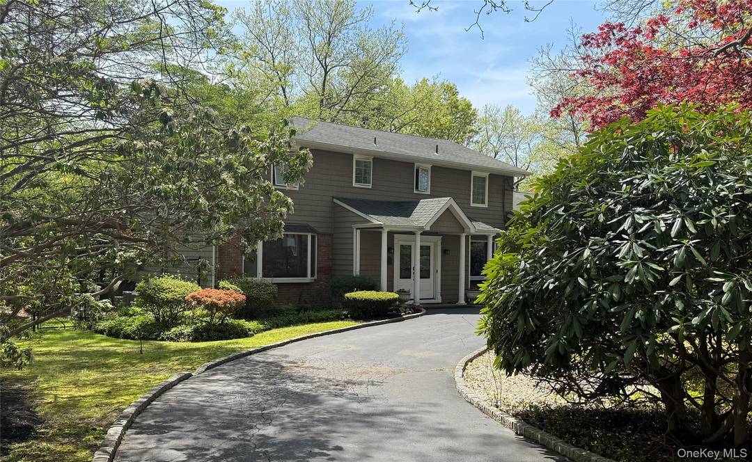 Welcome to 8 Lisa Drive A Premium Corner Property in the Heart of Dix Hills !