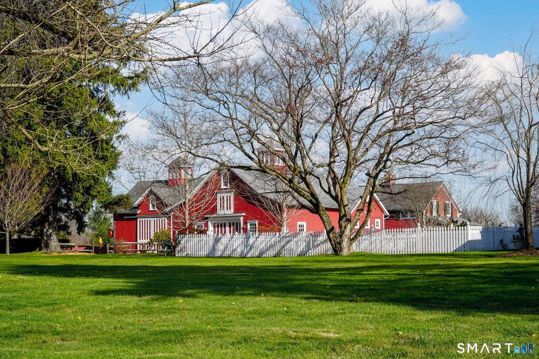 The Legacy Estate An Oenoke Ridge Masterpiece The main brick residence captures the essence of Gilded Age elegance with 10 12 ft ceilings, eight fireplaces, a classic wrap around porch, ...