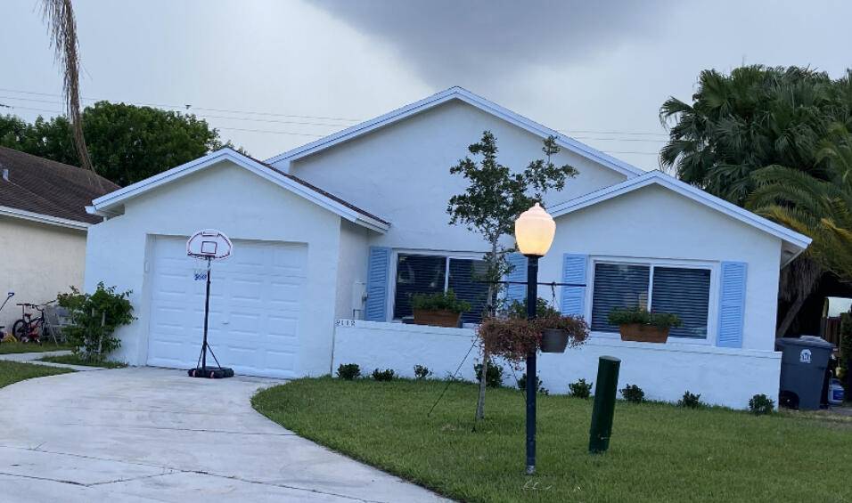 This beautiful single family home is nestled in the highly desirable Pine Springs neighborhood, right in the heart of West Boca.