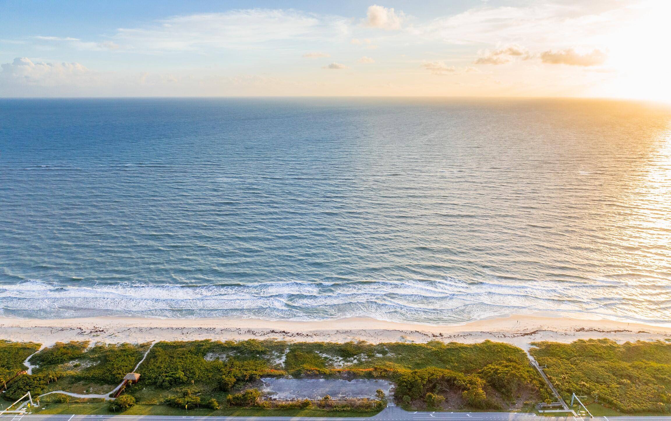 One of 5 direct oceanfront lots available for sale, this 80' wide lot presents an incredible opportunity to capitalize on panoramic views of the coastline, sea, endless open sky.