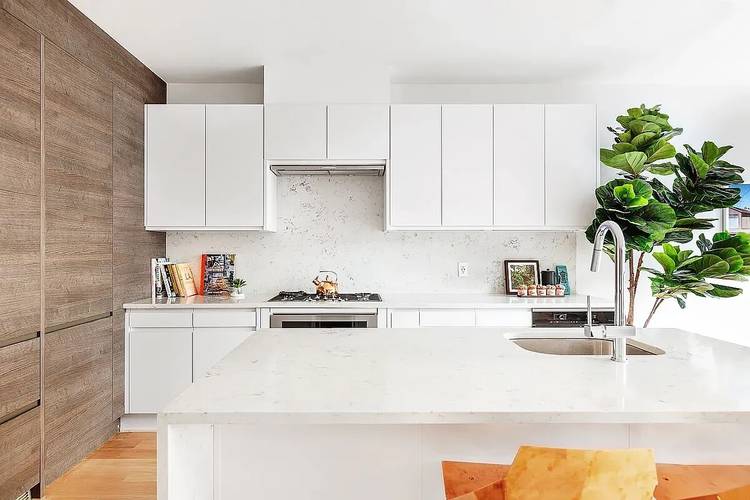 Perched atop the building's upper two floors, this stunning four bedroom, three bathroom duplex offers an exceptional layout, abundant natural light, and breathtaking views.