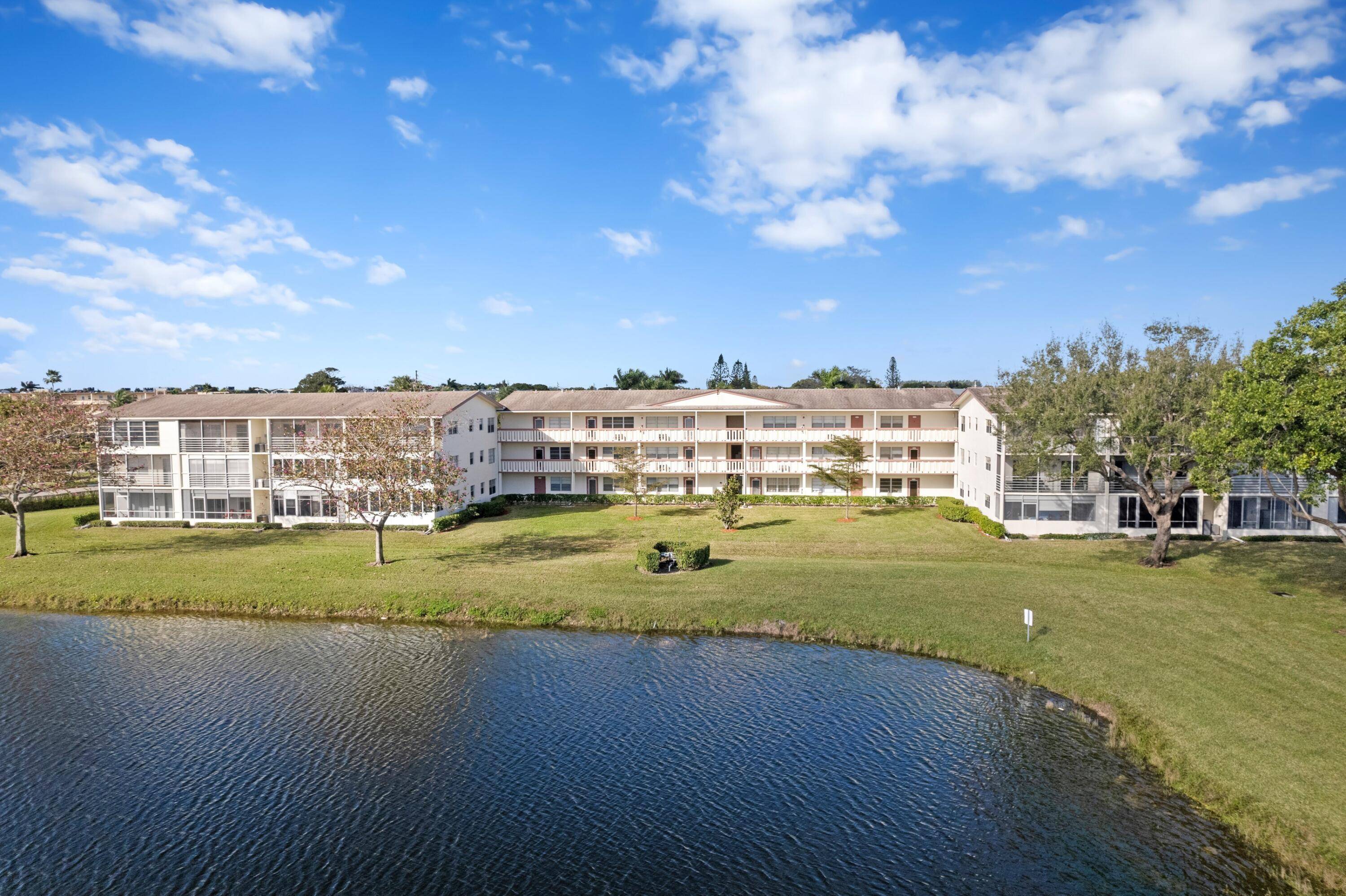 BEAUTIFUL WATERFRONT CONDO NEW WH, AC UNIT UPDATED KITCHEN 2024 FIRST FLOOR UNIT HIGHLY DESIRABLE CENTURY VILLAGE ACTIVE ADULT COMMUNITY Bright Open Floor Plan Tile Flooring Updated Kitchen Granite Counter ...