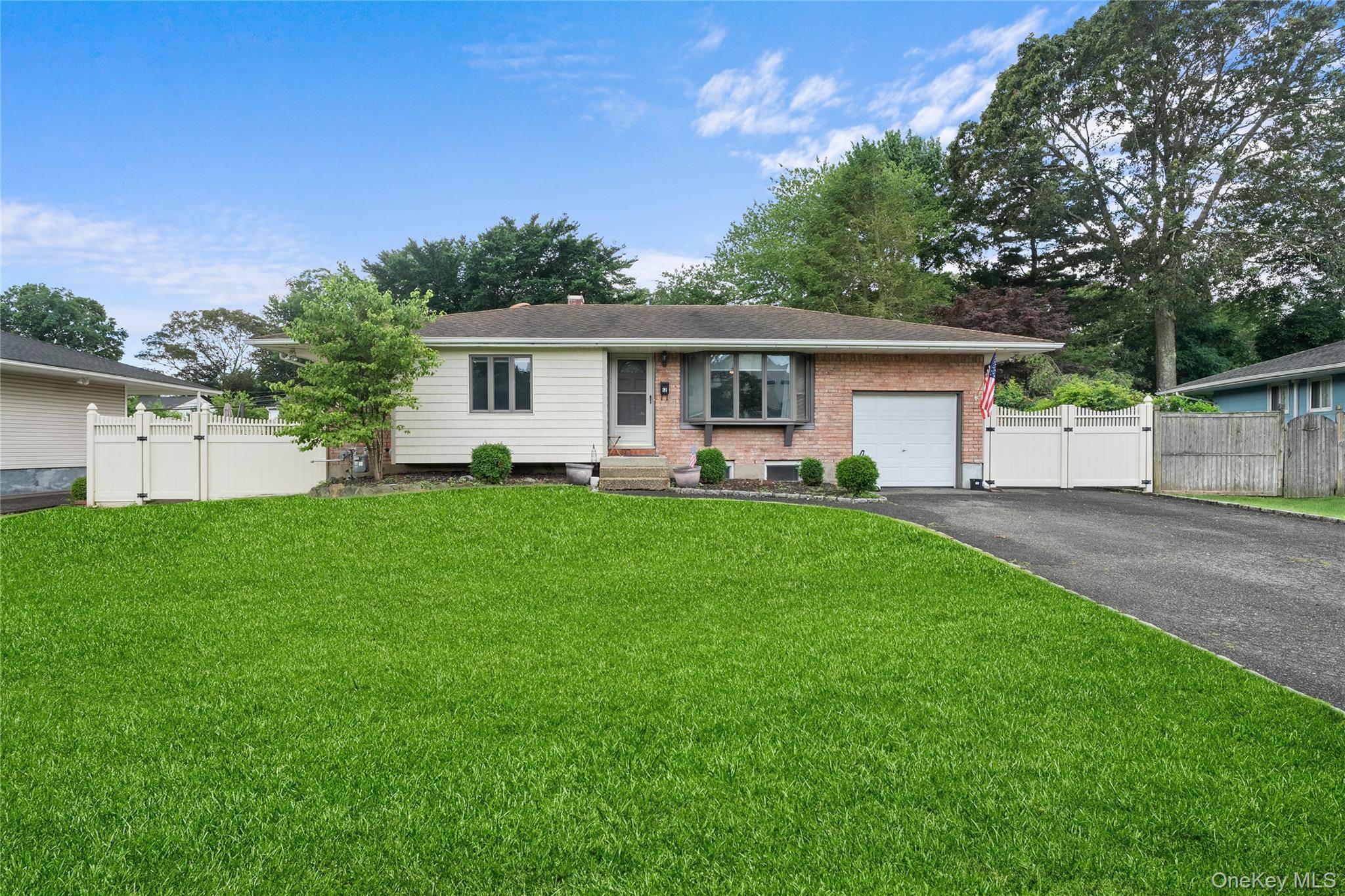 Welcome to 12 Donna Lane, a spacious and well maintained home nestled in the heart of Commack and located within the highly regarded Commack School District.
