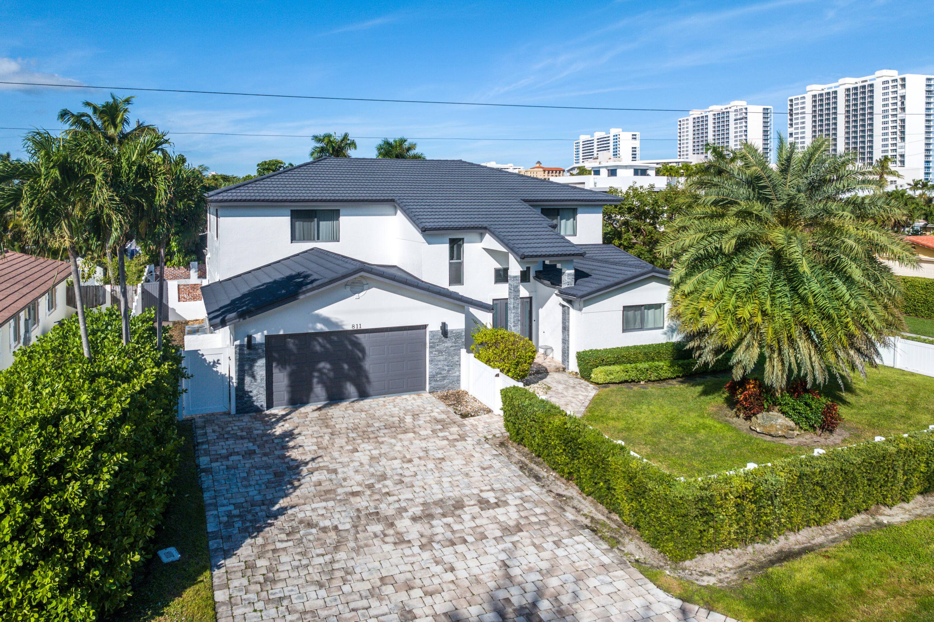 Welcome to your dream coastal retreat just a short stroll from the sun drenched shores of Boca Raton.