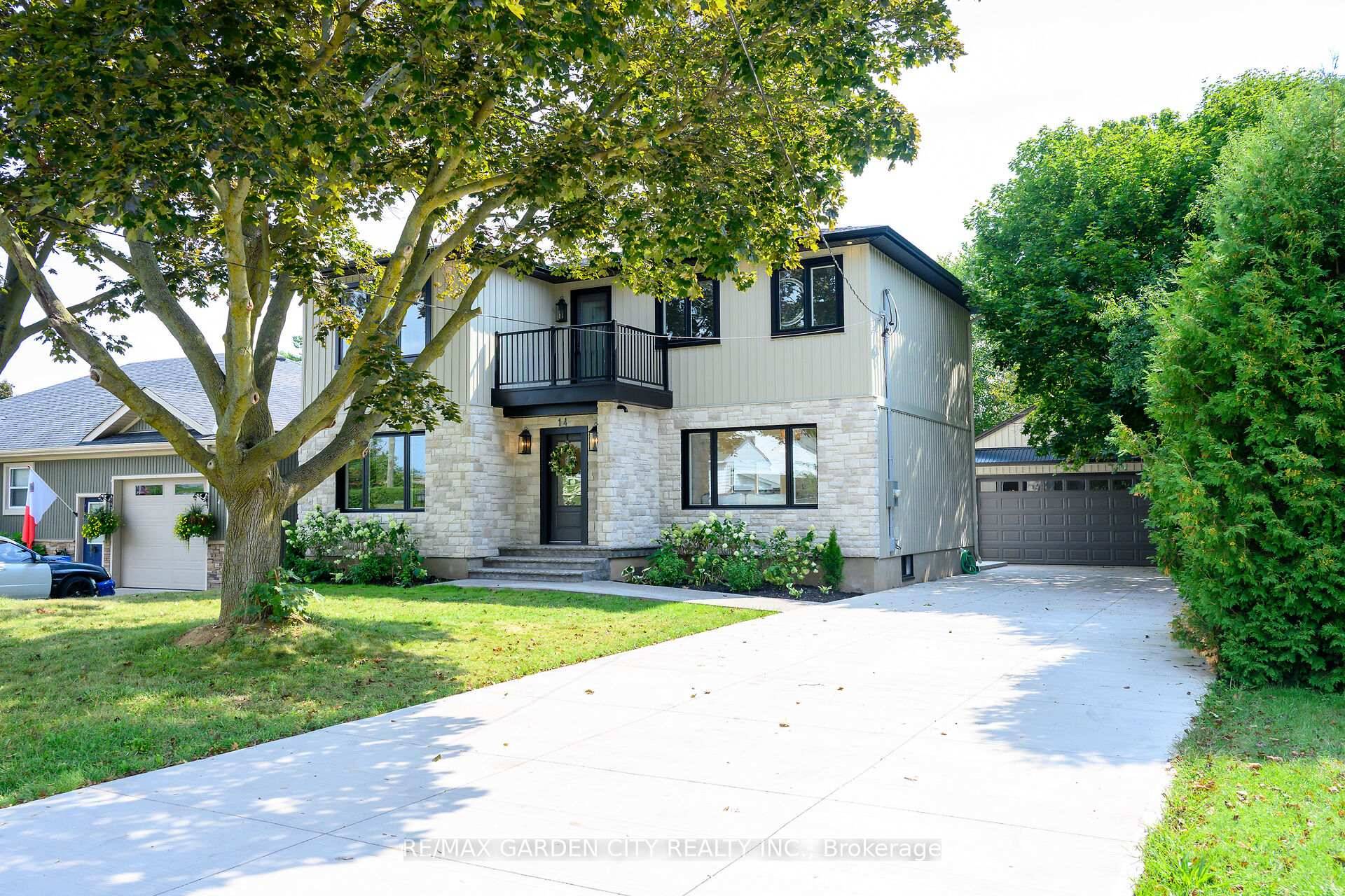 LUXURIOUS, NEWLY FINISHED 4 BEDROOM HOME ON LARGE PROPERTY IN MOST DESIRABLE LAKEFRONT NEIGHBORHOOD !