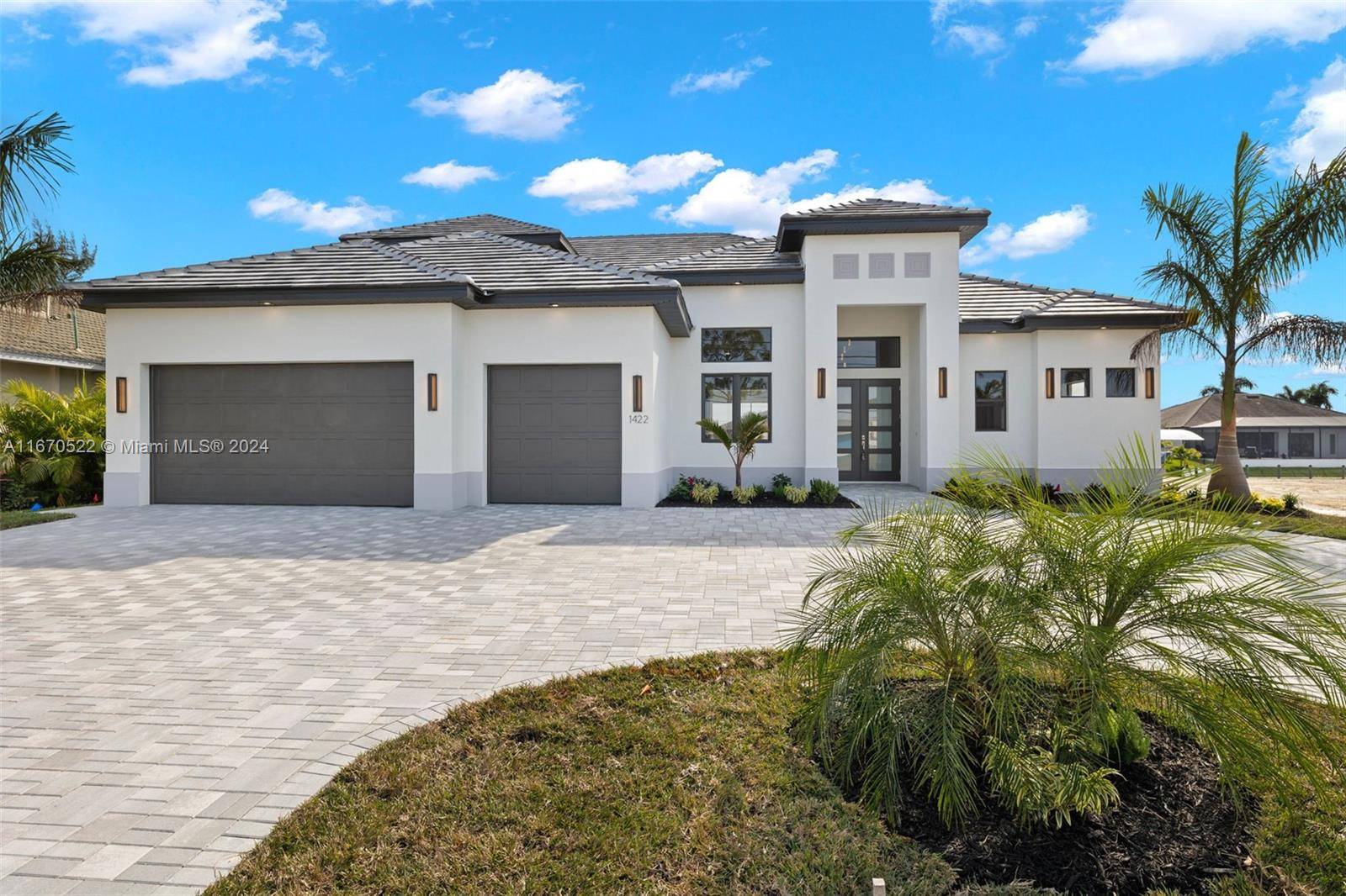 Prepare to be amazed by this spectacular Gulf Access NEW construction home in Southwest Cape Coral, your dream home in paradise.