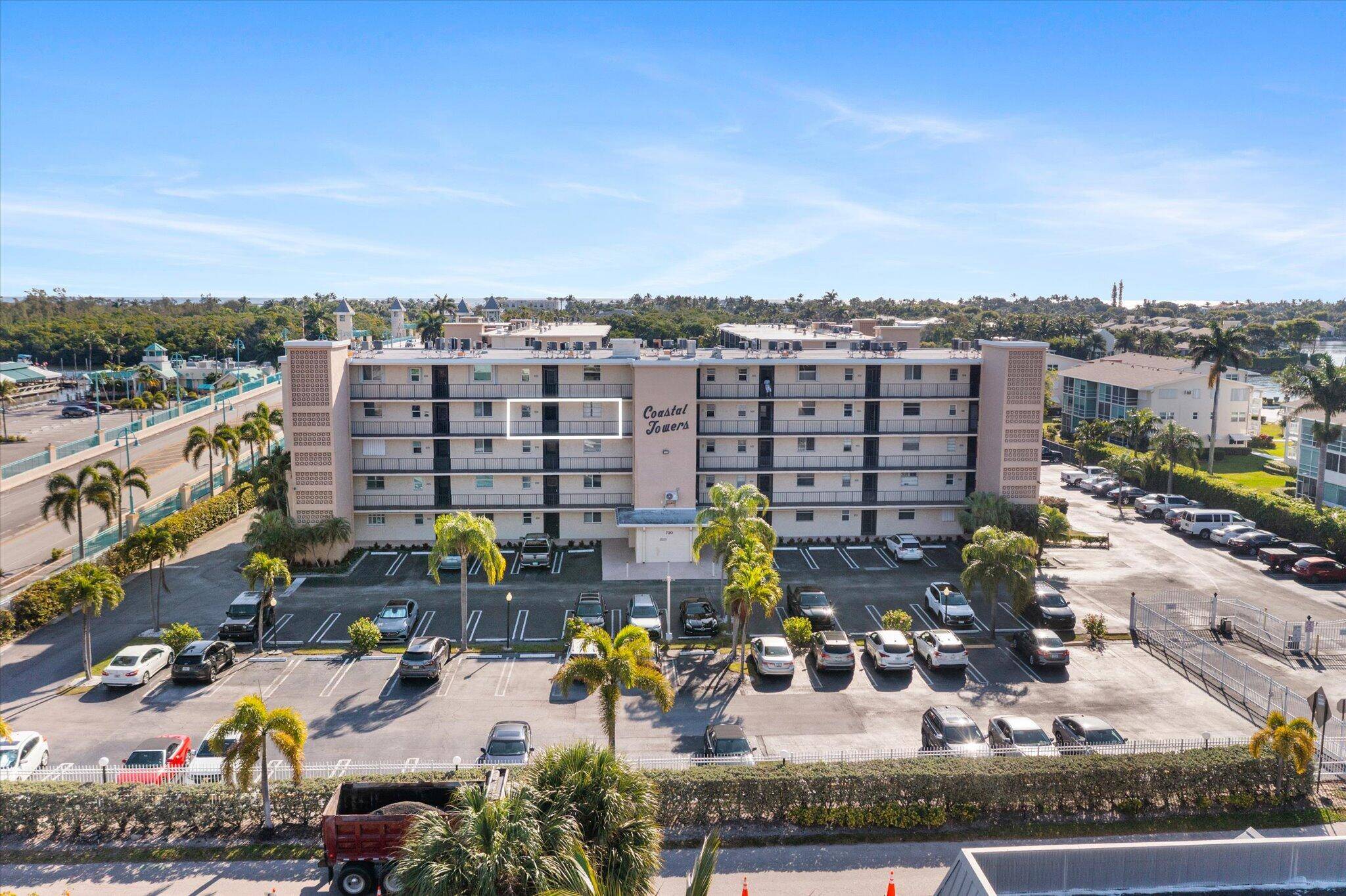 Discover coastal living at its finest in this charming 2 bedroom, 2 bathroom gated condo nestled along the Intracoastal, just one block from the beach.