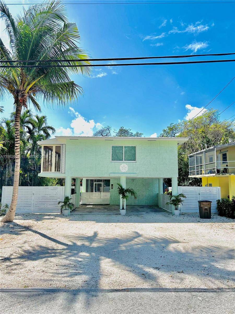 Welcome to your fully renovated island retreat at 352 Mahogany Dr in the heart of Key Largo.
