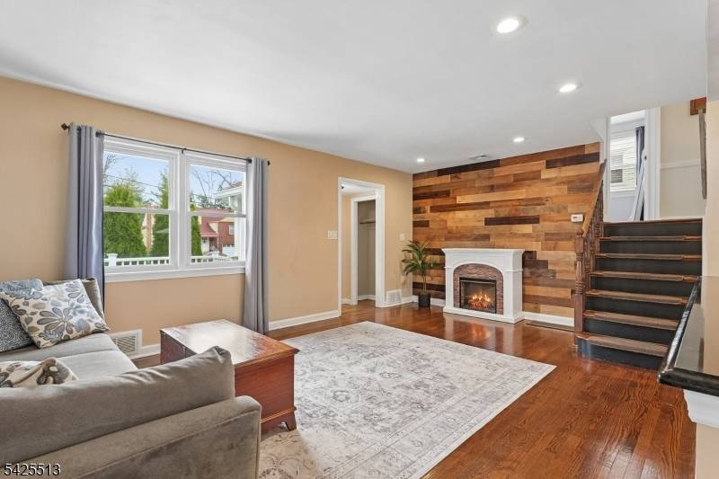 Perfectly positioned near the prestigious Baltusrol Golf Club, this inviting home pairs charming curb appeal with everyday convenience on a serene, tree lined street.